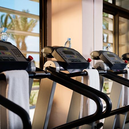 Moevenpick Hotel & Casino Malabata Tanger Екстер'єр фото Treadmills at a gym