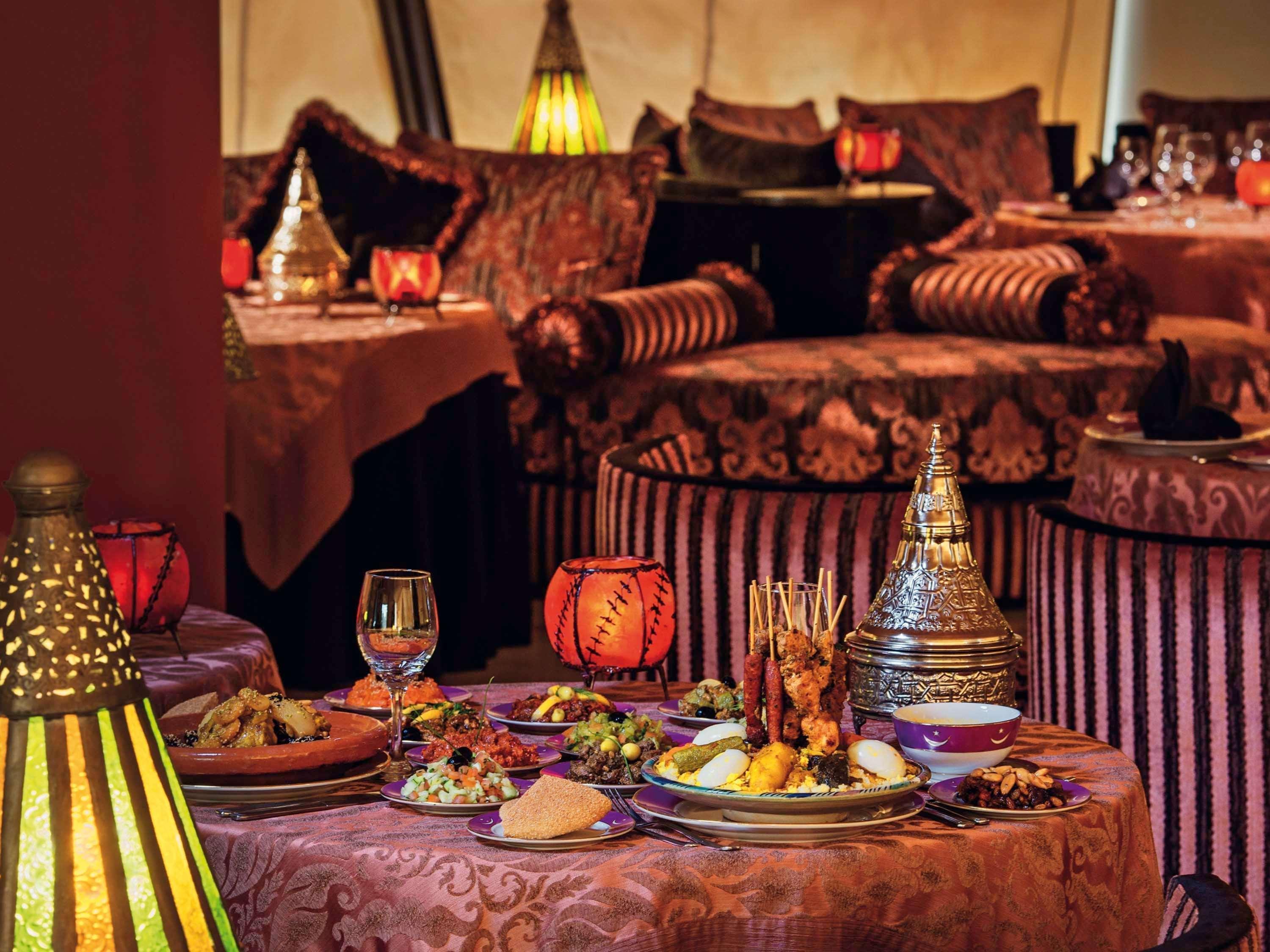 Moevenpick Hotel & Casino Malabata Tanger Екстер'єр фото A table at Al Dar